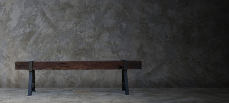 Old,Wooden,Bench,In,A,Room,With,Concrete,Floor,And