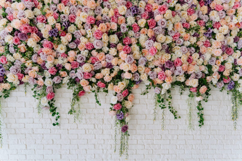 Beautiful,Decorative,Colorful,Roses,On,Brick,Wall.,Wedding,Party,Decor