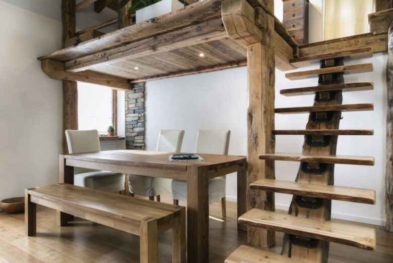 Wooden,Table,In,Dining,Room,Under,Mezzanine