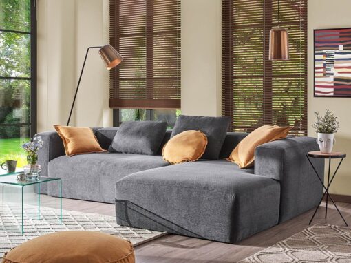 Soggiorno con divano grigio: idee di arredo