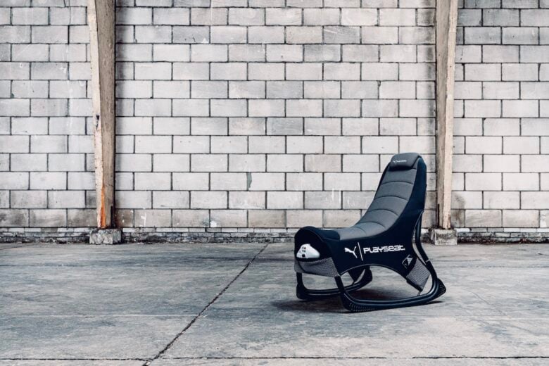 Playseat-PUMA-Active-Gaming-Seat-with-controller-and-phone