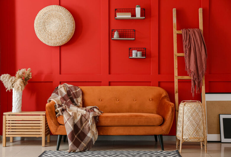 Zona living con pareti Cherry Tomato