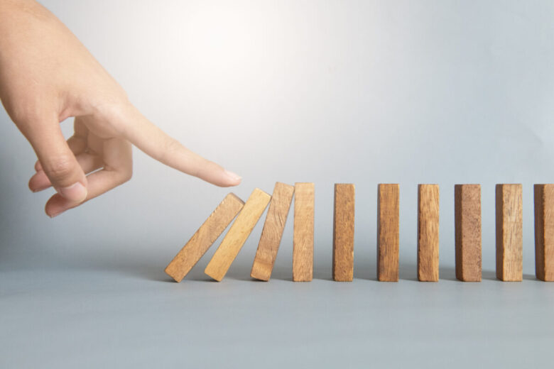 Hand,Stop,A,Dominoes,Continuous,Toppled