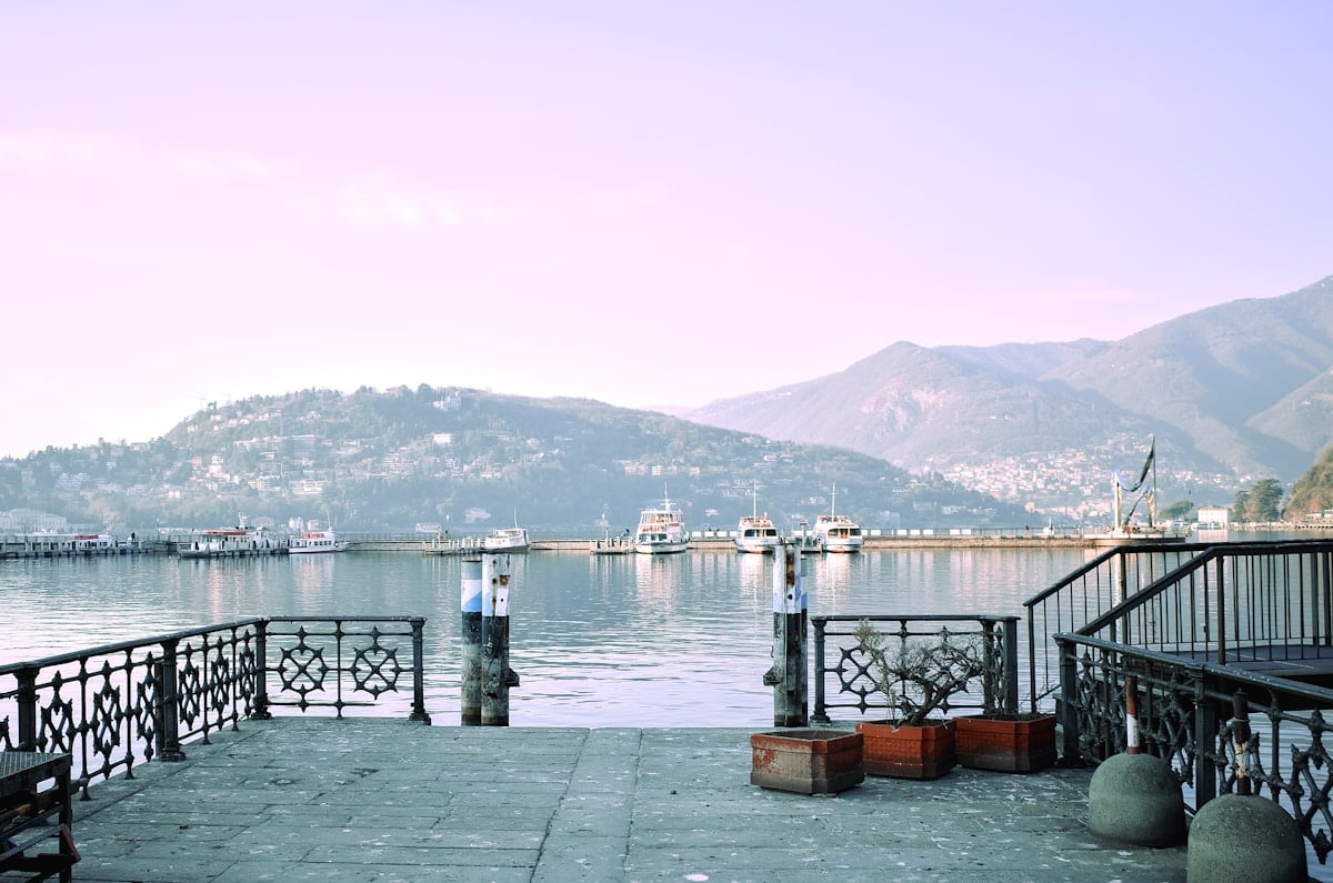 a view of a body of water with mountains in the background a view of a body of water with mountains in the background