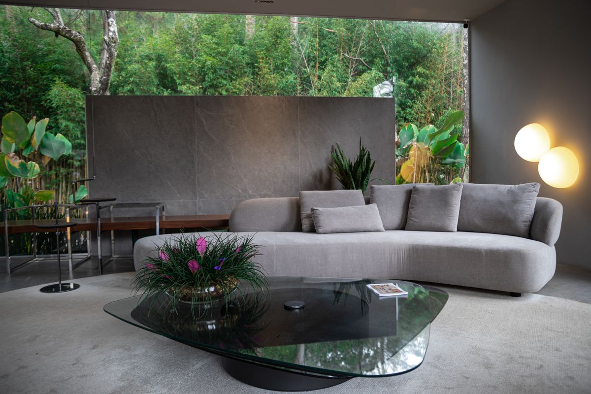 Stylish living room featuring a sleek sofa and coffee table in Belo Horizonte, Brazil.