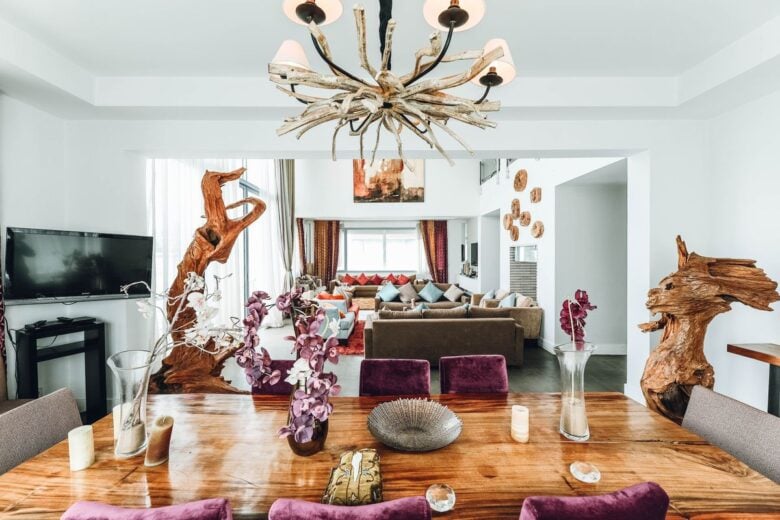 Luxurious dining room with unique chandelier and vibrant design elements.