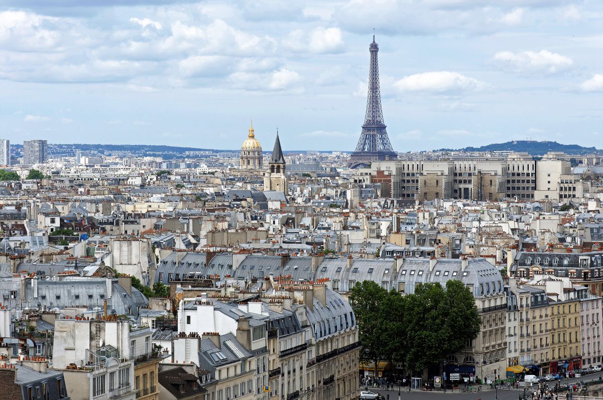 Stunning aerial shot of Paris cityscape featuring the iconic Eiffel Tower and historic architecture. Stunning aerial shot of Paris cityscape featuring the iconic Eiffel Tower and historic architecture.