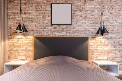 Camere da letto con pareti in pietra